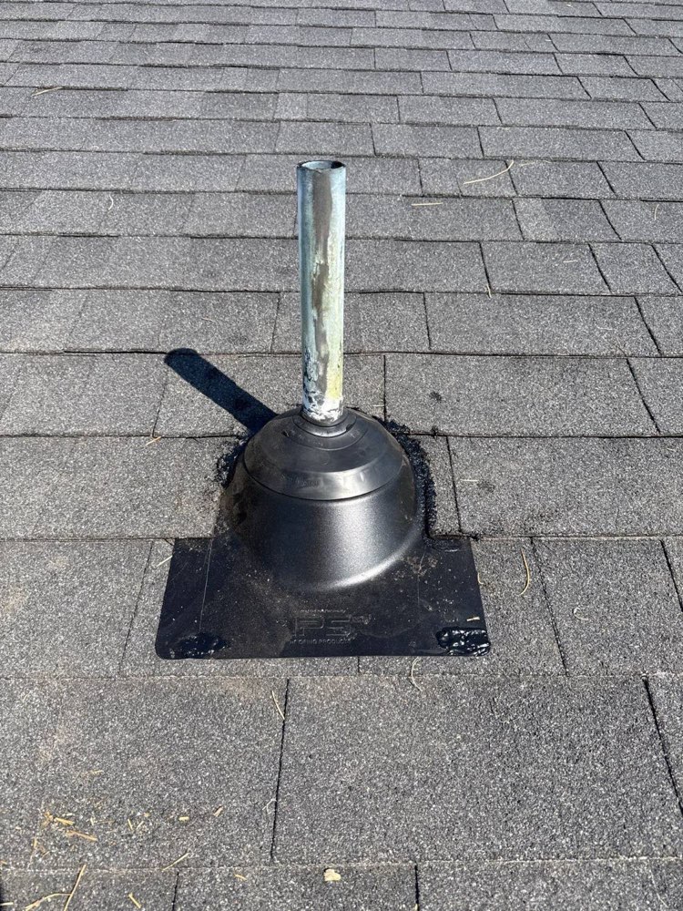 New pipe jack installed around a plumbing vent pipe on an asphalt shingle roof in North Idaho