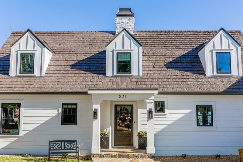 A Brava synthetic cedar shake roof on a home, shown up close