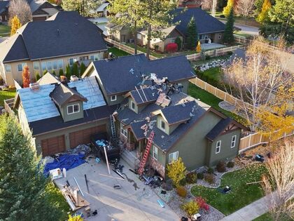New shingles being installed