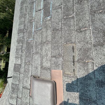 Vent cap with the shingles around it marked