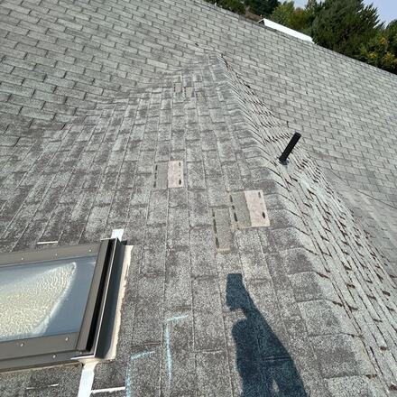 Skylight and the surrounding shingles, marked and photographed