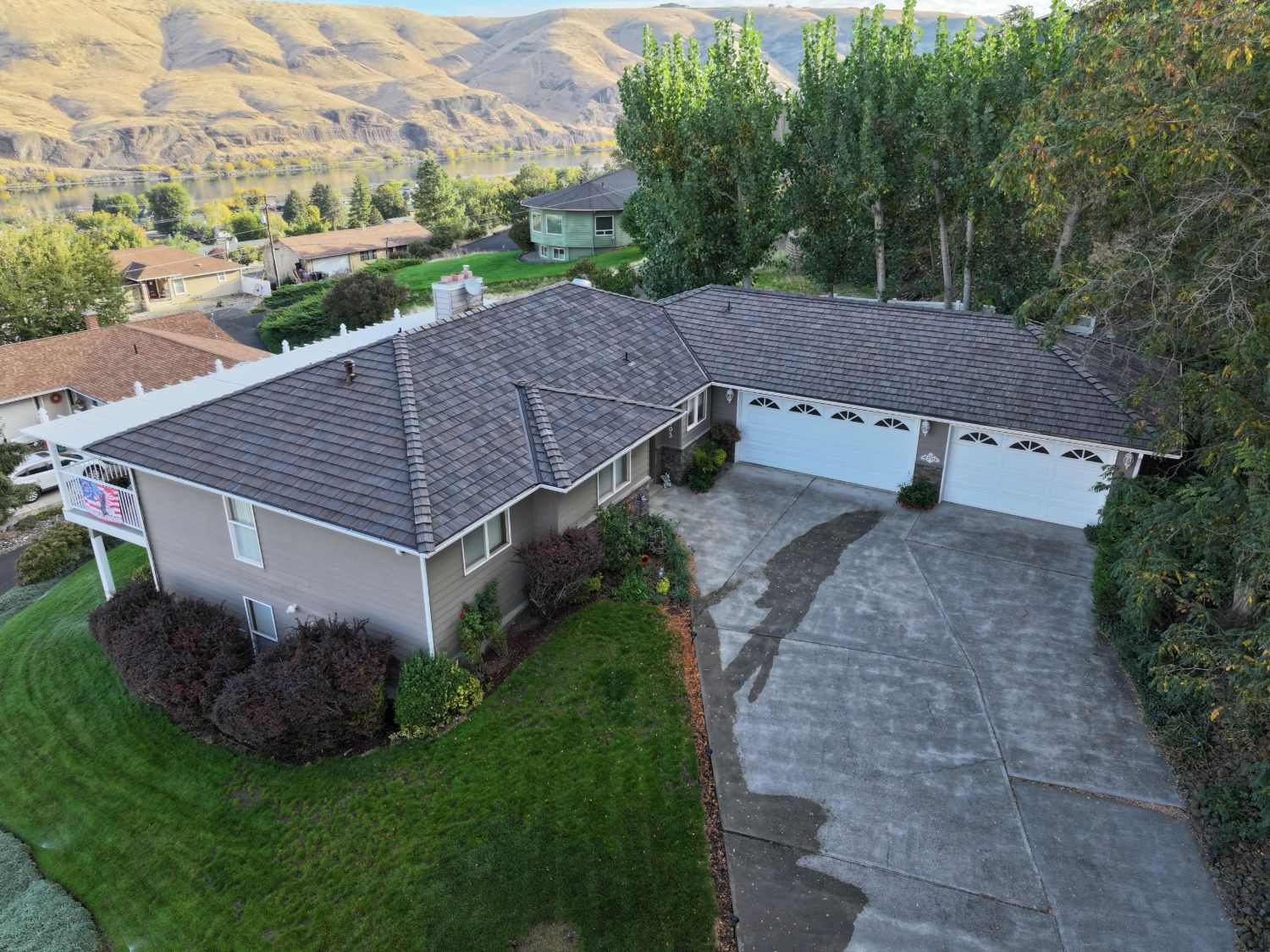 After: aerial view of the finished Brava Cedar Shake roof in Aged Cedar
