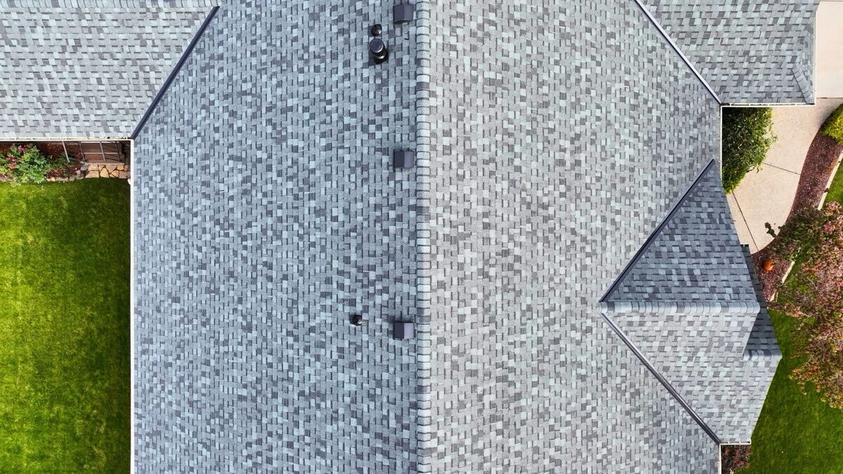 Aerial view of completed roof showing clean hip and ridge lines