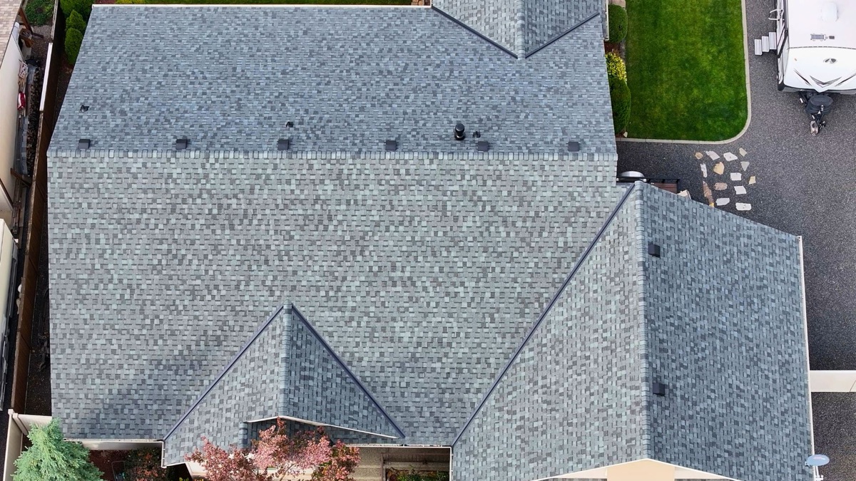 Top-down aerial view of completed Granite Gray roof showing full roof geometry