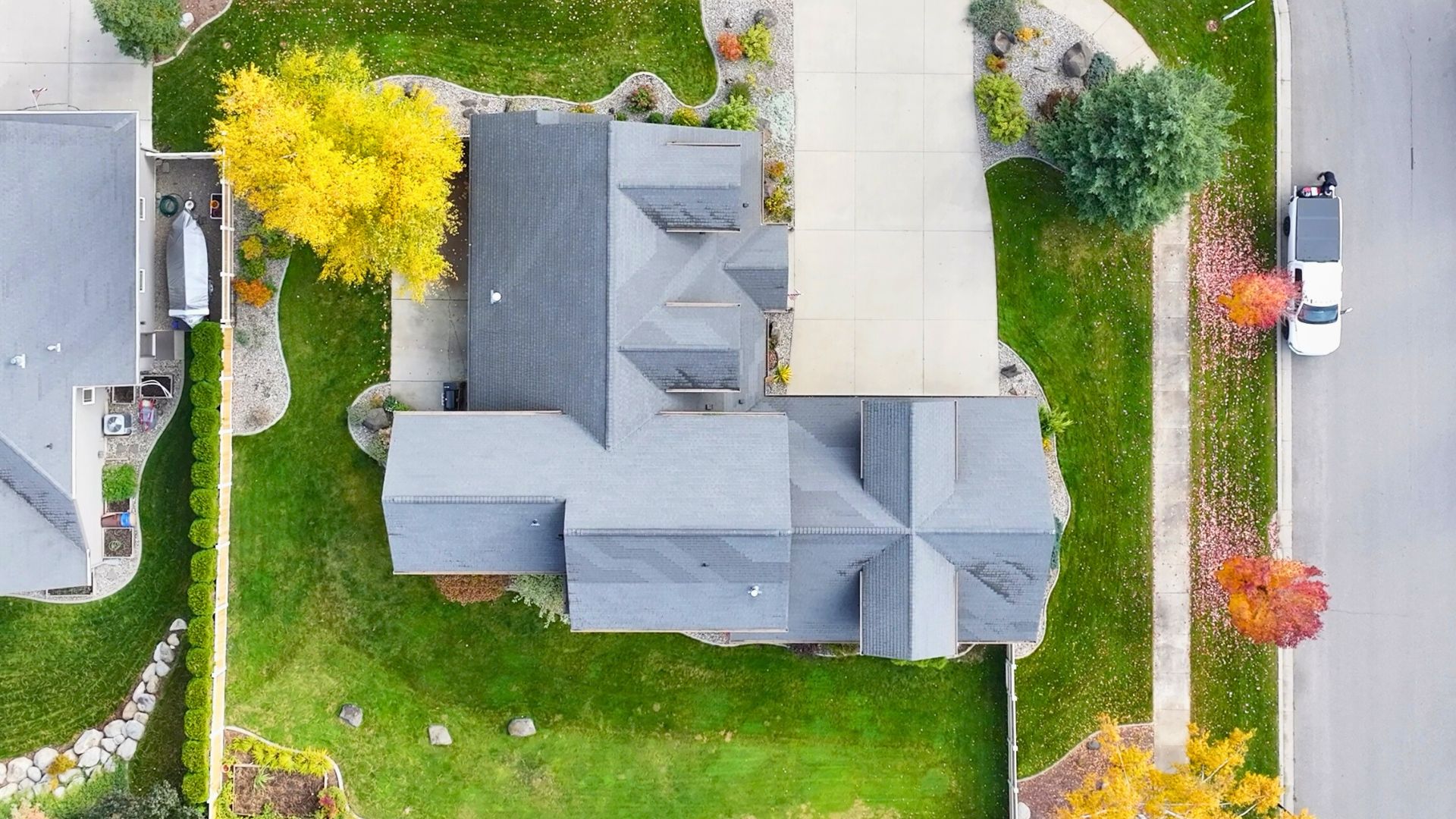 Top-down aerial showing full layout of aging roof