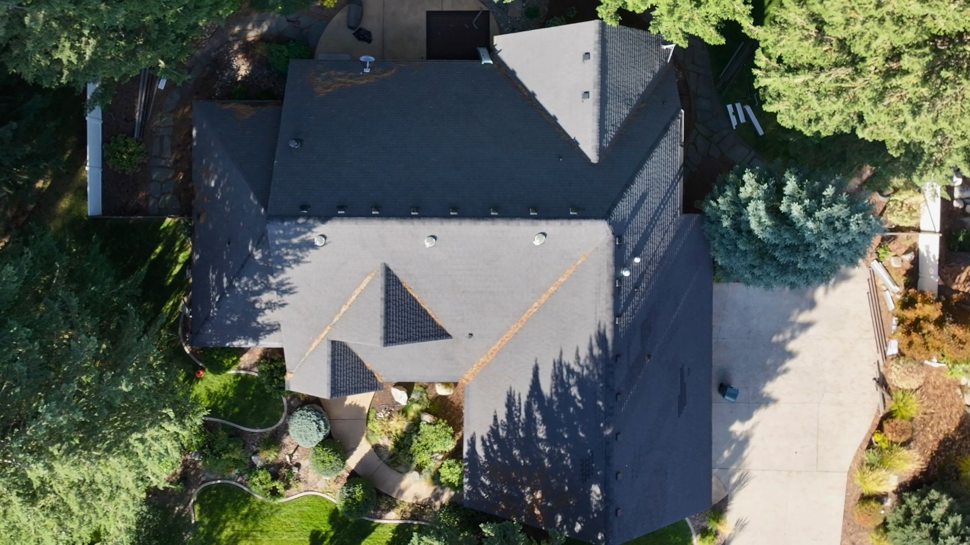 Before: aerial view of old damaged roof